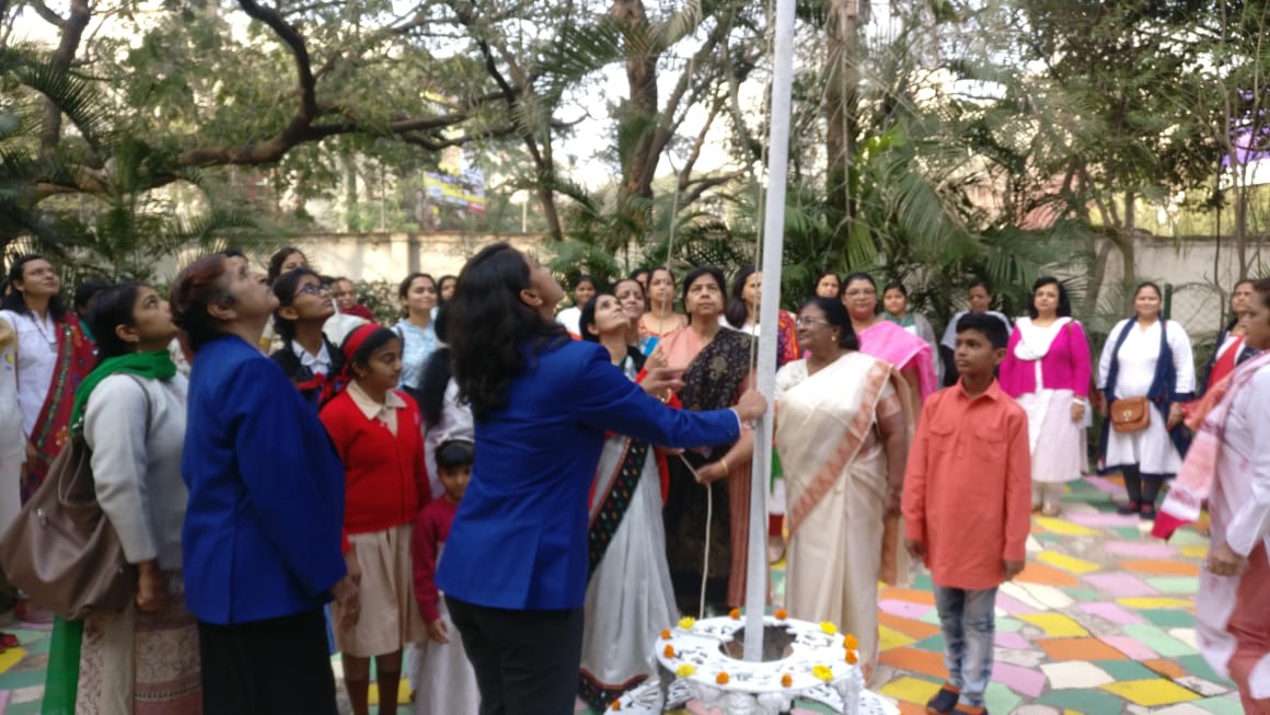 The flag hoisting by the college authorities and the chief guest Dr. Sunita Adhav